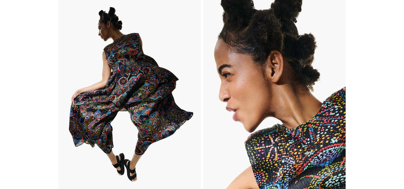 Left: Model wearing LIGHT FESTIVAL Tunic and Trousers in Black, captured mid-air in a dynamic pose against a white background. Right: Model in profile view wearing LIGHT FESTIVAL Tunic in Black, set against a white background.