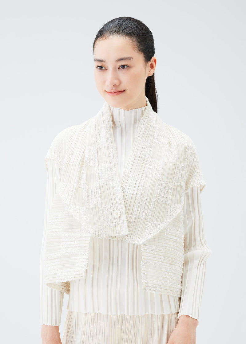 A model wears the PLEATS PLEASE ISSEY MIYAKE NEBULA vest.