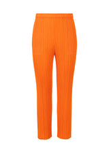 A product shot of the PLEATS PLEASE ISSEY MIYAKE  MONTHLY COLORS JULY trousers in orange (32)