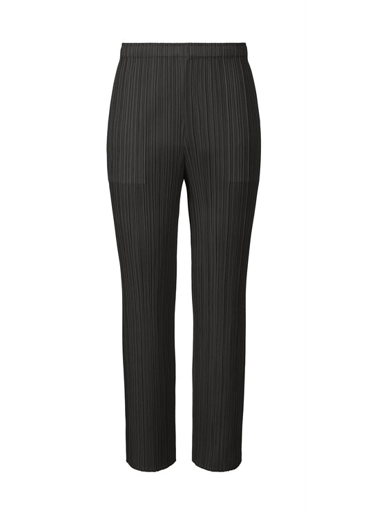 A product shot of the PLEATS PLEASE ISSEY MIYAKE MONTHLY COLORS OCTOBER trousers in black (15).