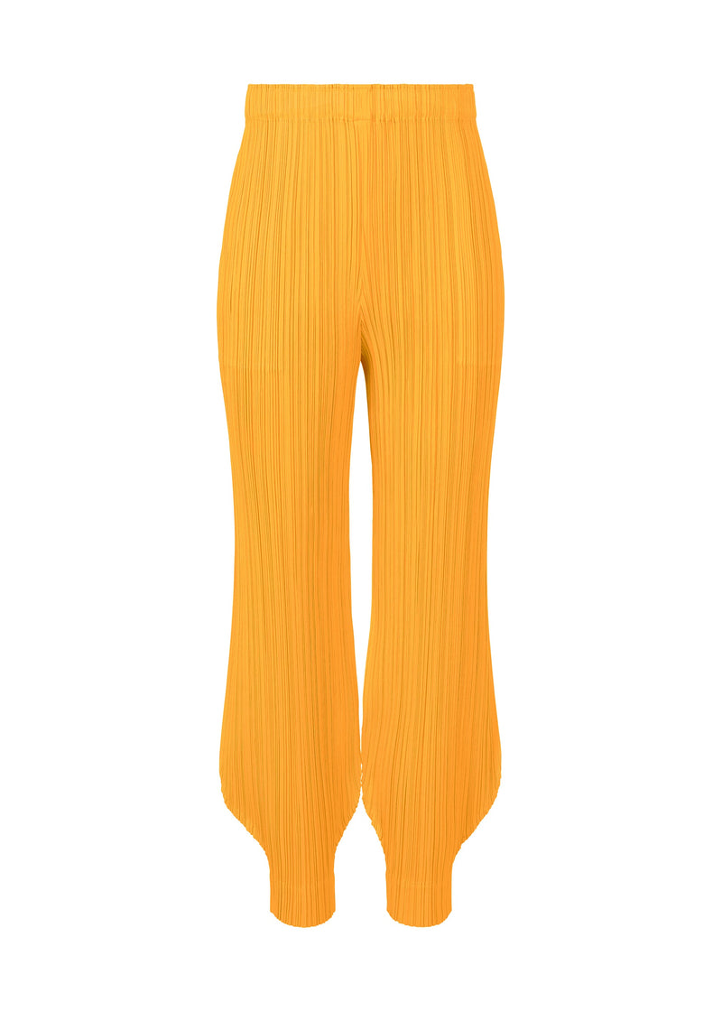 A product shot of the PLEATS PLEASE ISSEY MIYAKE MONTHLY COLORS OCTOBER trousers in yellow (52).