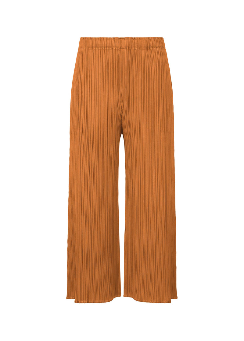 A product shot of the PLEATS PLEASE ISSEY MIYAKE MONTHLY COLORS NOVEMBER trousers in brown (44).