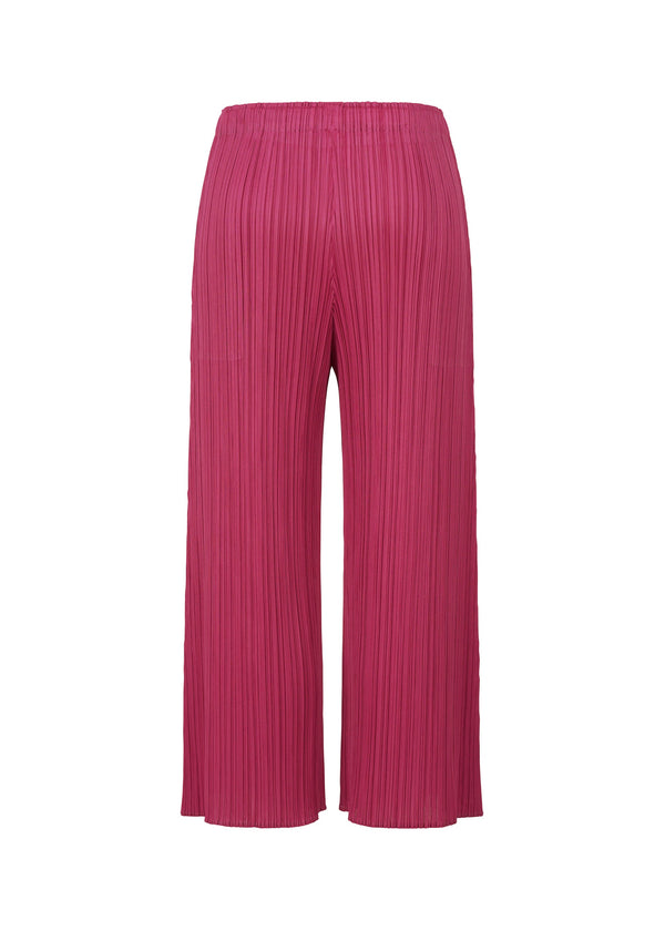 A detail shot of the PLEATS PLEASE ISSEY MIYAKE MONTHLY COLORS NOVEMBER trousers.