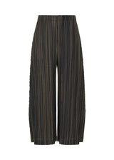 A product shot of the PLEATS PLEASE ISSEY MIYAKE METEOR SHOWER trousers in yellow (52).