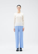 A model wears the PLEATS PLEASE ISSEY MIYAKE NEBULA trousers.