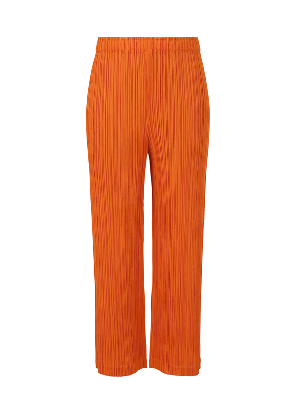 A product shot of the PLEATS PLEASE ISSEY MIYAKE  THICKER BOTTOMS 1 trousers in dark orange (33)