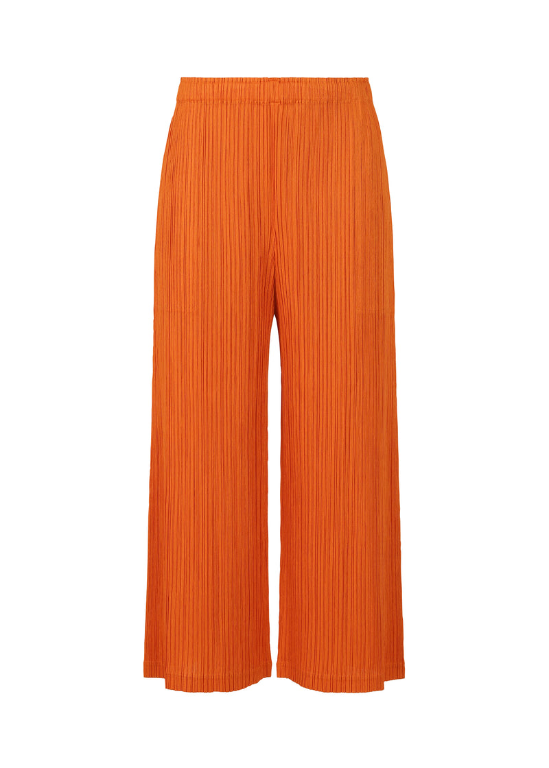 A product shot of the PLEATS PLEASE ISSEY MIYAKE  THICKER BOTTOMS 1 trousers in dark orange (33)