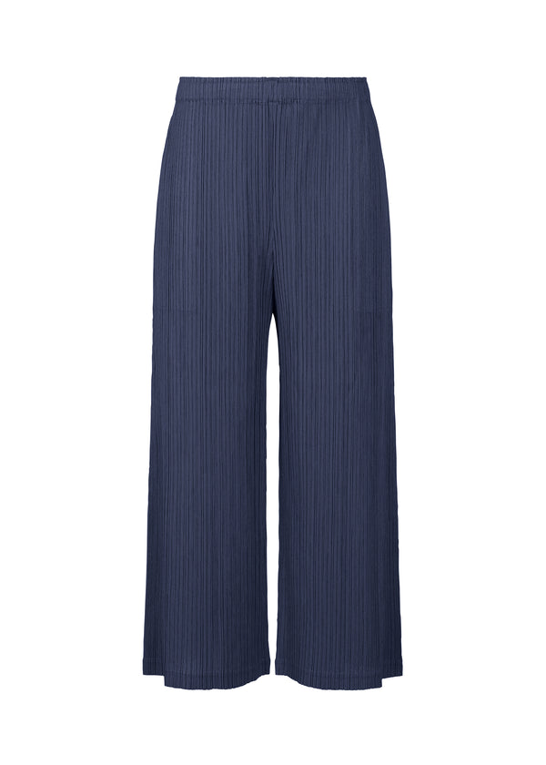 A product shot of the PLEATS PLEASE ISSEY MIYAKE  THICKER BOTTOMS 1 trousers in navy (75)