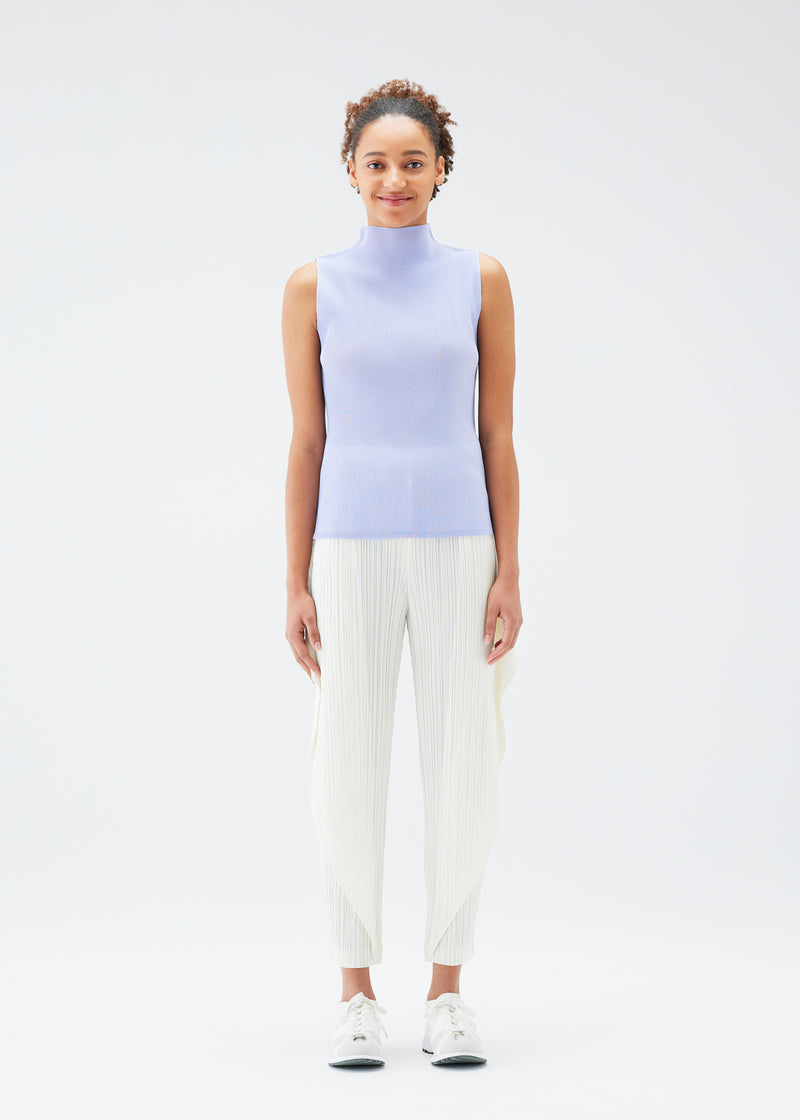 A model wears the PLEATS PLEASE ISSEY MIYAKE  THICKER BOTTOMS 1 trousers