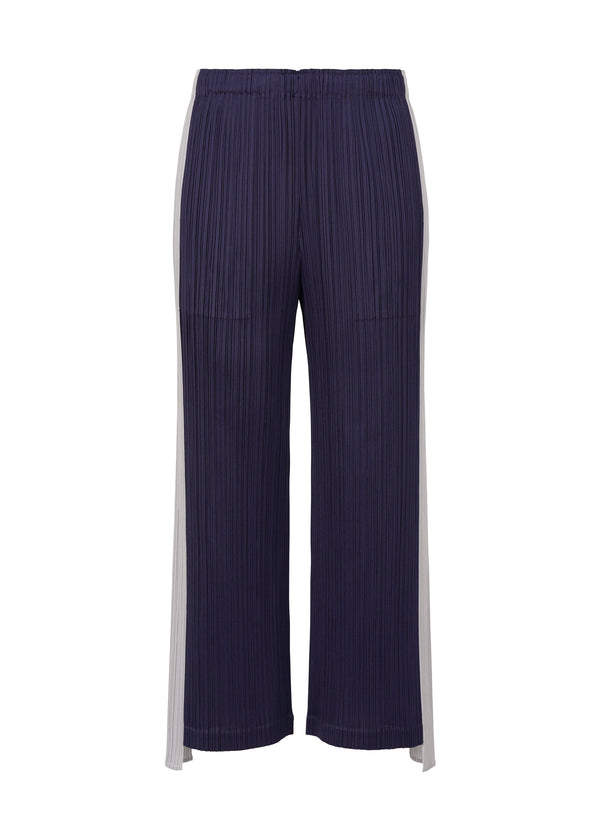 A product shot of the PLEATS PLEASE ISSEY MIYAKE  COMET trousers in navy (75)