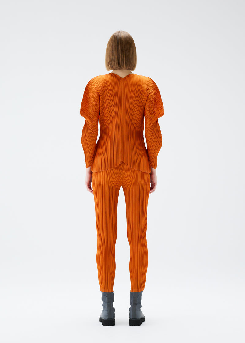 WORMHOLE Trousers Dark Orange