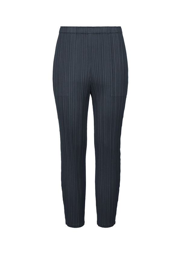 A product shot of the PLEATS PLEASE ISSEY MIYAKE WORMHOLE trousers in navy (75).