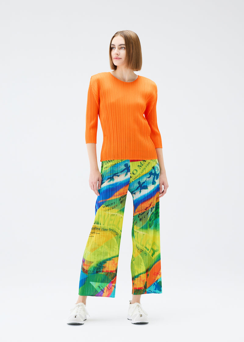 A model wears the PLEATS PLEASE ISSEY MIYAKE  VOYAGER trousers