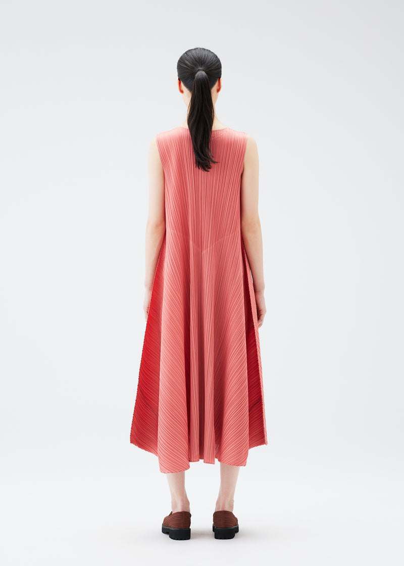 A model wears the PLEATS PLEASE ISSEY MIYAKE  SOLAR FLARE dress