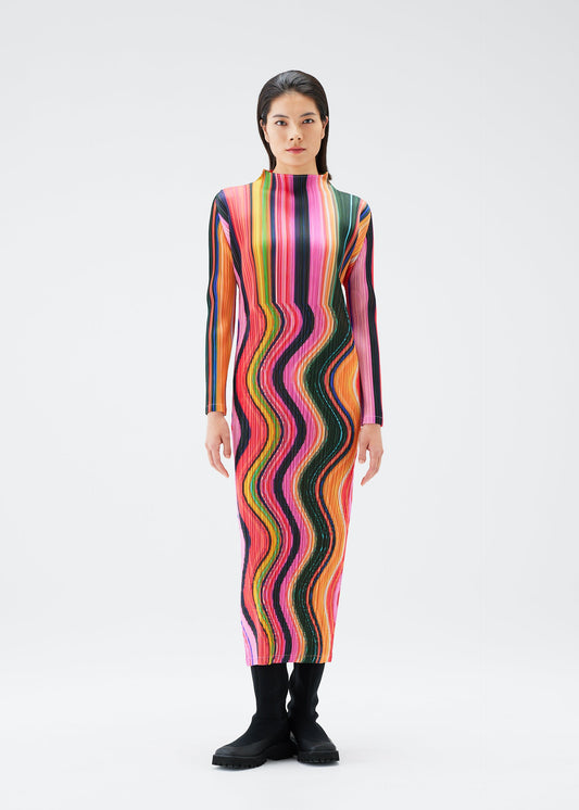 A model wears the PLEATS PLEASE ISSEY MIYAKE WARP dress.