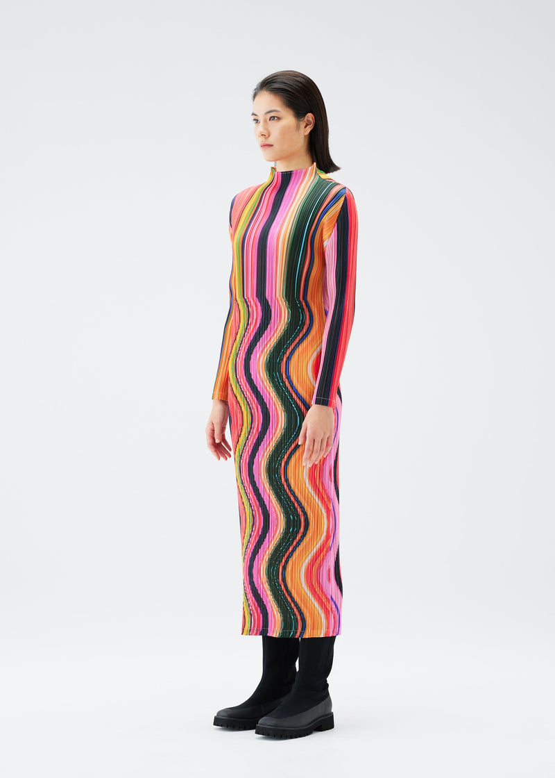 A model wears the PLEATS PLEASE ISSEY MIYAKE WARP dress.