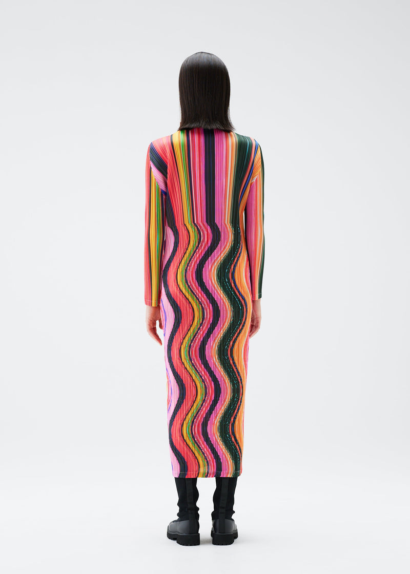 A model wears the PLEATS PLEASE ISSEY MIYAKE WARP dress.