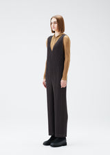 A model wears the PLEATS PLEASE ISSEY MIYAKE MONTHLY COLORS DECEMBER jumpsuit.