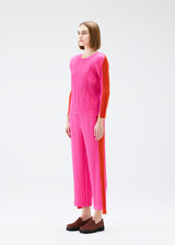 A model wears the PLEATS PLEASE ISSEY MIYAKE  COMET top