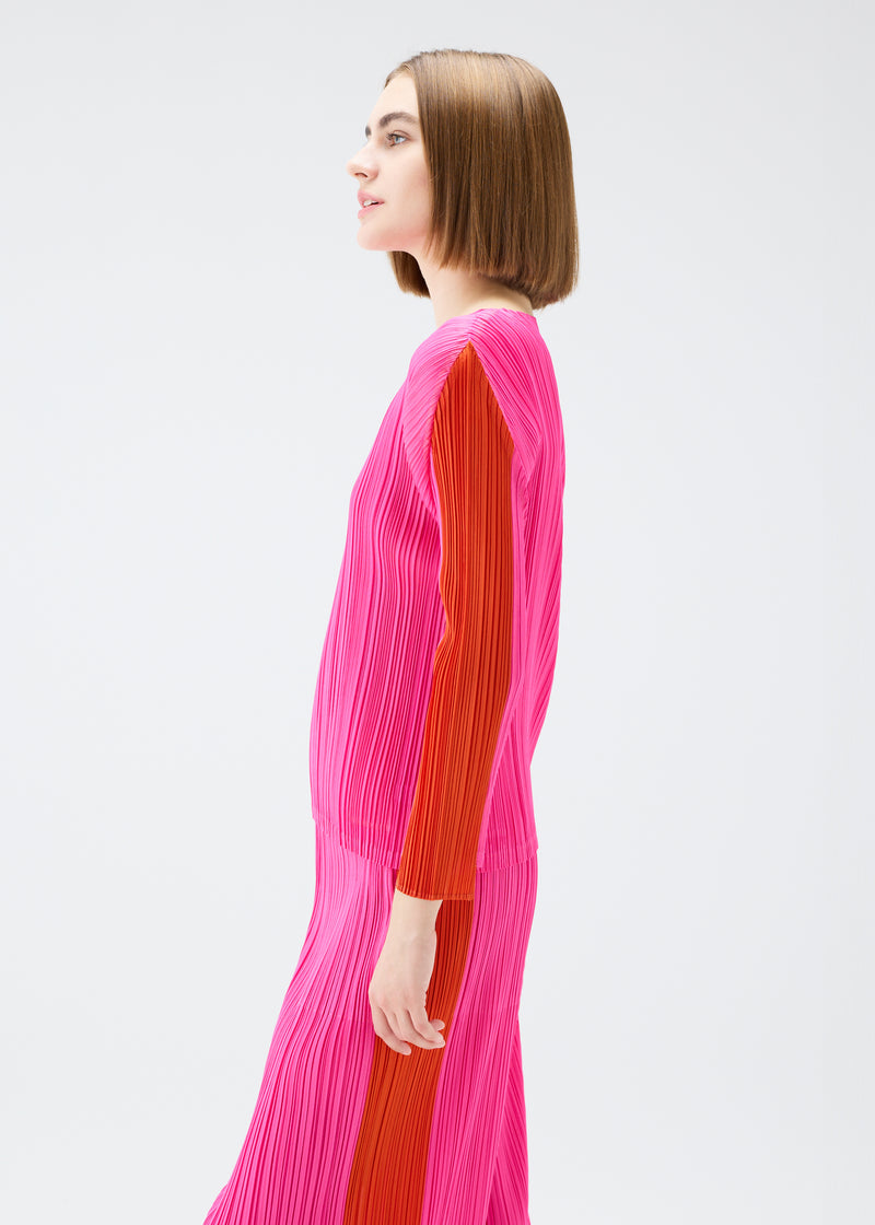 A model wears the PLEATS PLEASE ISSEY MIYAKE  COMET top