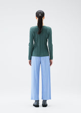 A model wears the PLEATS PLEASE ISSEY MIYAKE SOFT PLEATS top.