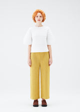 A model wears the PLEATS PLEASE ISSEY MIYAKE  MUSHROOM KNIT top