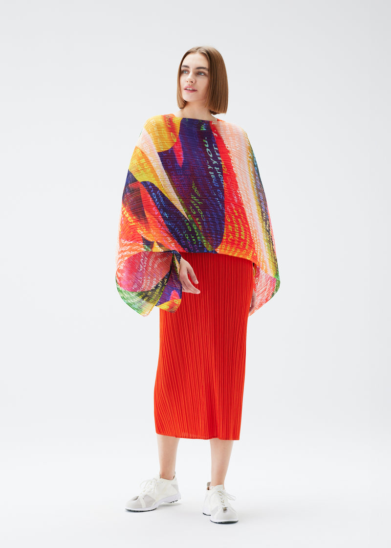 A model wears the PLEATS PLEASE ISSEY MIYAKE  VOYAGER MADAME T stole