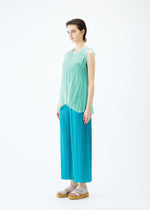 A model wears the PLEATS PLEASE ISSEY MIYAKE SHEER TWIST top.