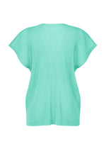 A detail shot of the PLEATS PLEASE ISSEY MIYAKE TATAMI APRIL top.