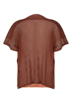 A detail shot of the PLEATS PLEASE ISSEY MIYAKE SHEER SQUARE cardigan.