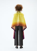 A model wears the PLEATS PLEASE ISSEY MIYAKE PHOTON vest.