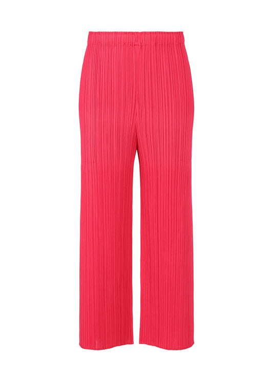 A product shot of the PLEATS PLEASE ISSEY MIYAKE MONTHLY COLORS MARCH trousers in bright pink (21).