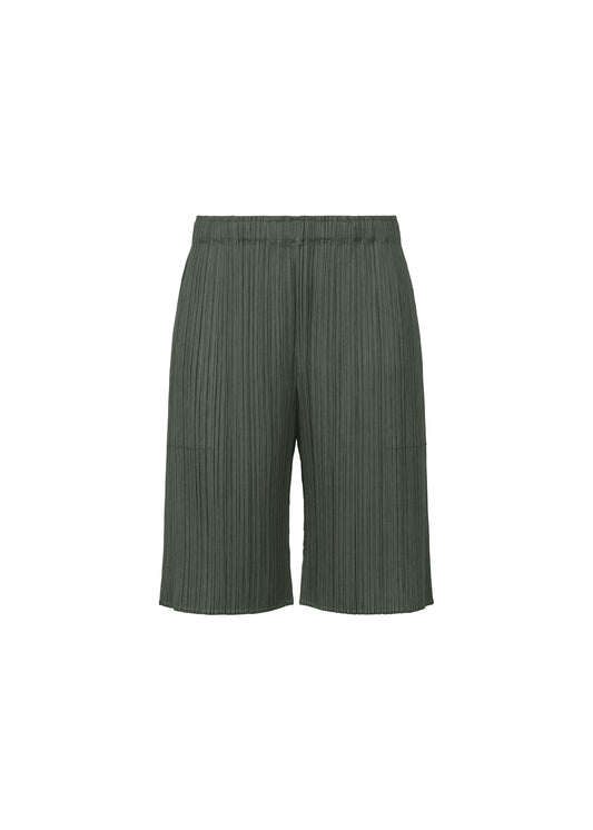 A product shot of the PLEATS PLEASE ISSEY MIYAKE MONTHLY COLORS : JUNE trousers in charcoal grey (6).