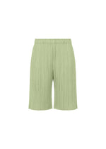 A product shot of the PLEATS PLEASE ISSEY MIYAKE MONTHLY COLORS : JUNE trousers in pastel green (58).