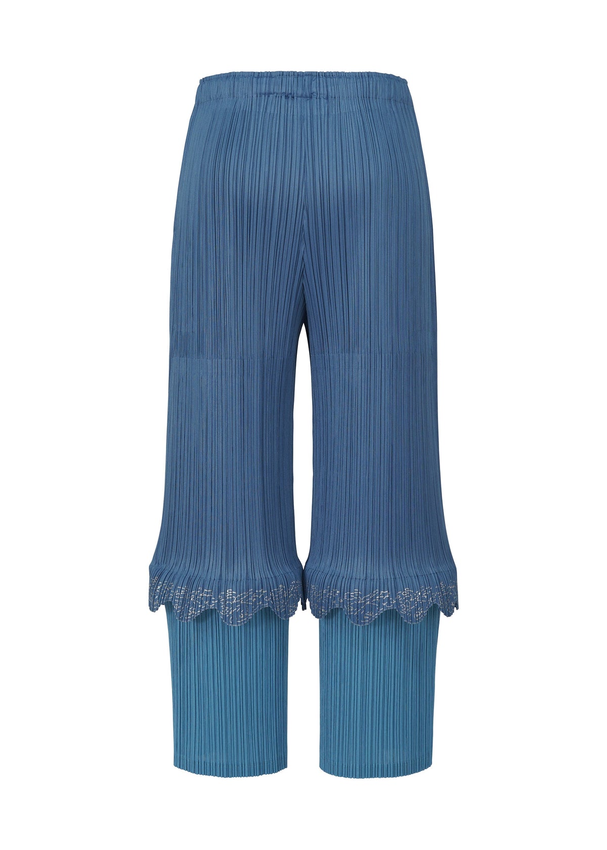 A detail shot of the PLEATS PLEASE ISSEY MIYAKE TWINKLE trousers.