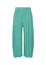 A product shot of the PLEATS PLEASE ISSEY MIYAKE MELLOW PLEATS trousers in turquoise green (61).