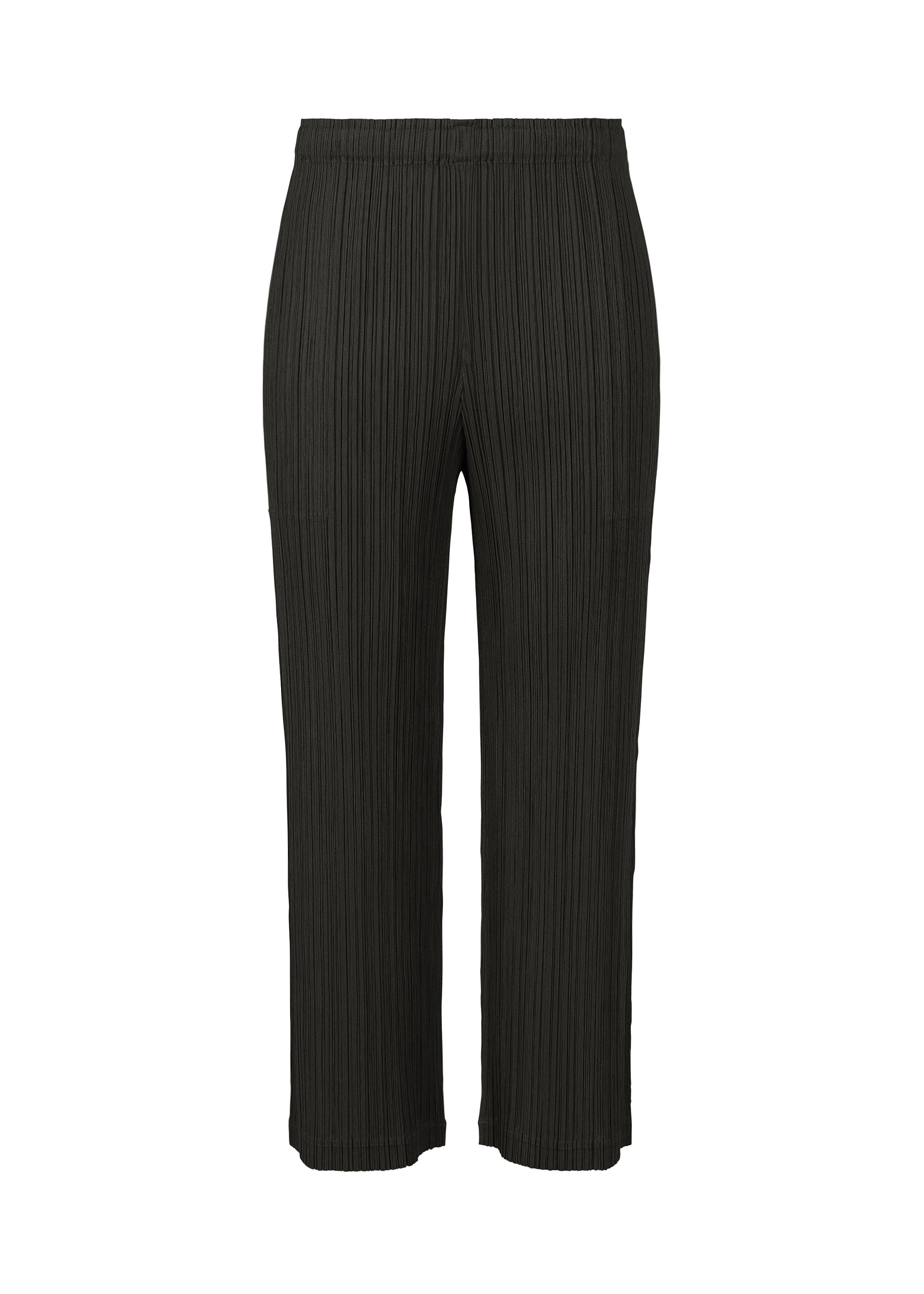 A product shot of the PLEATS PLEASE ISSEY MIYAKE THICKER BOTTOMS 2 trousers in black (15).