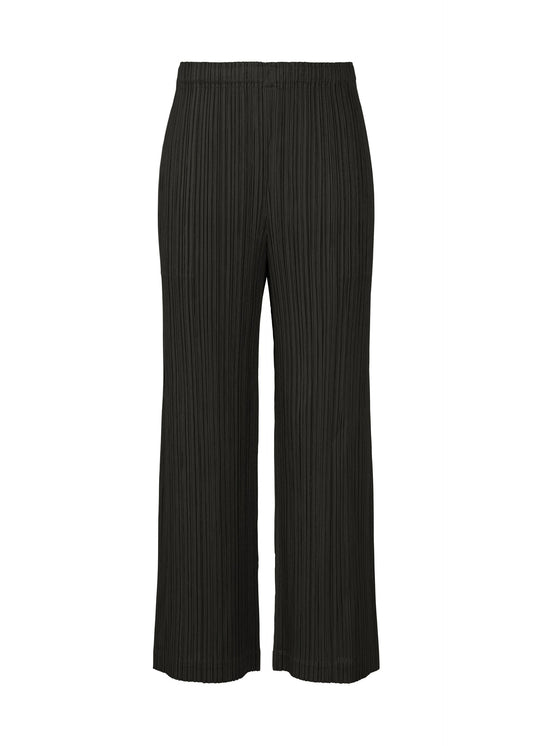 A product shot of the PLEATS PLEASE ISSEY MIYAKE THICKER BOTTOMS 2 trousers in black (15).