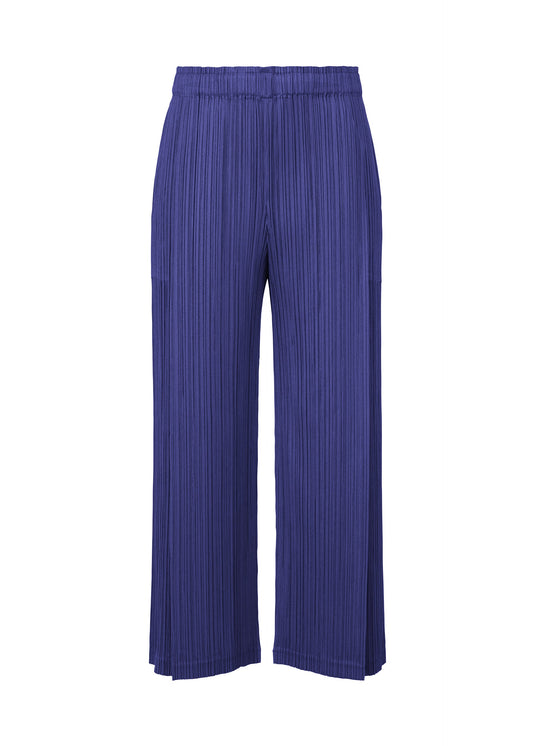 A product shot of the PLEATS PLEASE ISSEY MIYAKE LIGHT WAVE trousers in blue (72).