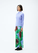 A model wears the PLEATS PLEASE ISSEY MIYAKE BACKLIGHT trousers.