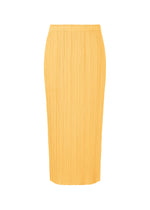 A product shot of the PLEATS PLEASE ISSEY MIYAKE MONTHLY COLORS MARCH skirt in apricot yellow (30).