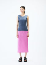 A model wears the PLEATS PLEASE ISSEY MIYAKE LOOP BOTTOMS skirt.