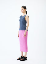 A model wears the PLEATS PLEASE ISSEY MIYAKE LOOP BOTTOMS skirt.