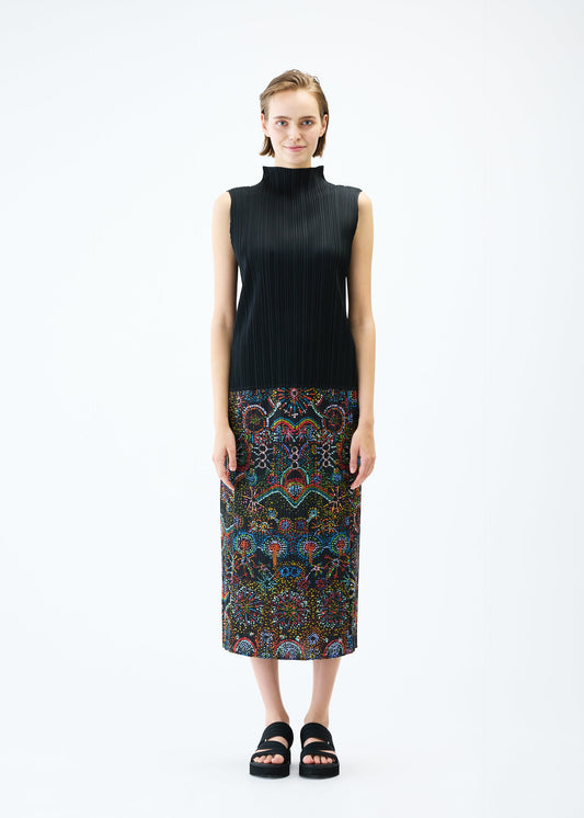 A model wears the PLEATS PLEASE ISSEY MIYAKE LIGHT FESTIVAL skirt.