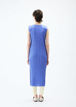 A model wears the PLEATS PLEASE ISSEY MIYAKE MONTHLY COLORS MARCH dress.