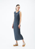A model wears the PLEATS PLEASE ISSEY MIYAKE MONTHLY COLORS MAY dress.