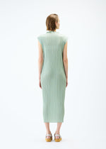 A model wears the PLEATS PLEASE ISSEY MIYAKE MONTHLY COLORS : JUNE dress.