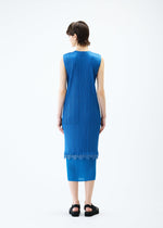 A model wears the PLEATS PLEASE ISSEY MIYAKE TWINKLE dress.