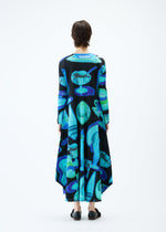 A model wears the PLEATS PLEASE ISSEY MIYAKE THERMAL FOODS dress.