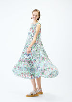 A model wears the PLEATS PLEASE ISSEY MIYAKE LIGHT FESTIVAL dress.